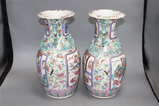 A pair of 19th century Chinese enamelled porcelain vases, height 34cm